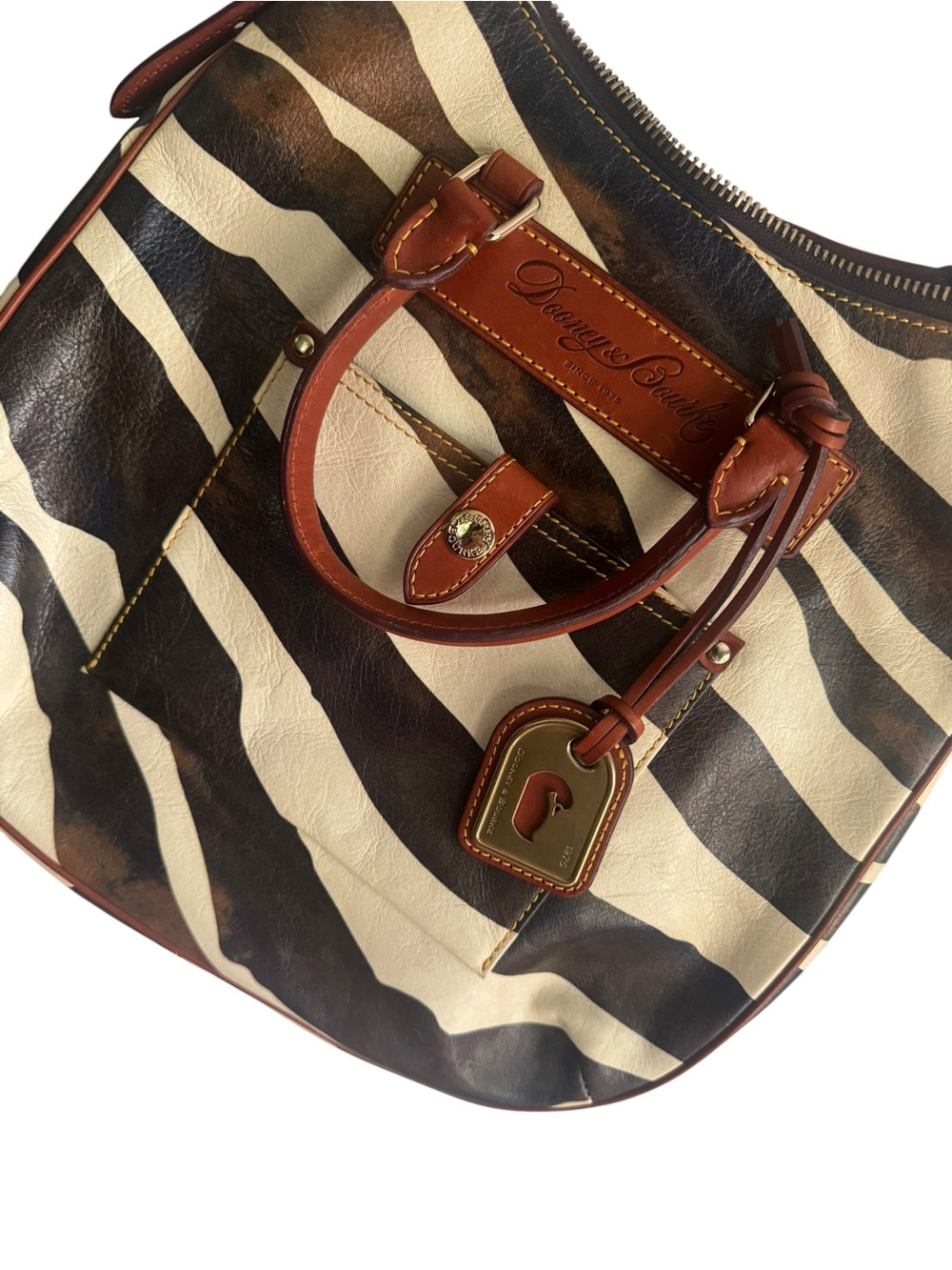 Dooney and Bourke Genuine Florentine Vacchetta LeatherDomed Satchel Crossbody